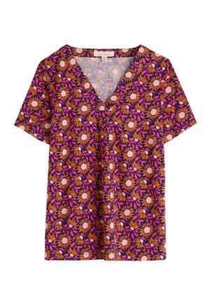 Short-sleeve, V-neck blouse made of fabric featuring bold floral patterns in pink, orange, and cream on a dark background.