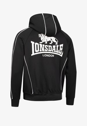 Sudadera negra con acentos blancos y el logo de Lonsdale London. Cuenta con un bolsillo tipo canguro y puños acanalados, fabricada en un tejido suave y ligero.
