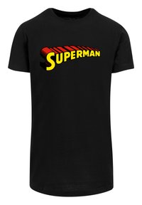 Black cotton t-shirt featuring a bold yellow and red "SUPERMAN" logo, with a curved design, located across the chest area.