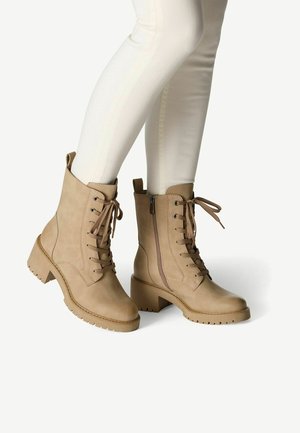 Bottines à plateau - taupe