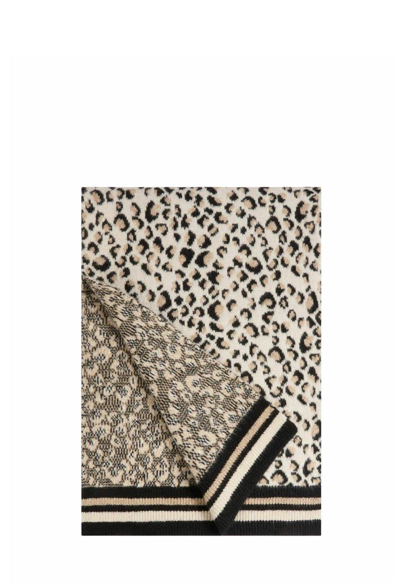 Tessuto lavorato a maglia con motivo leopardato e strisce a contrasto nere e crema nella parte inferiore. La texture appare morbida e calda.