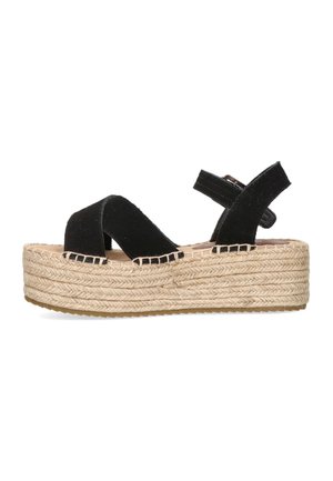 Sandalias de plataforma negras de espadrille con tiras de tela texturizada, suela de yute trenzado y correa ajustable en el tobillo.
