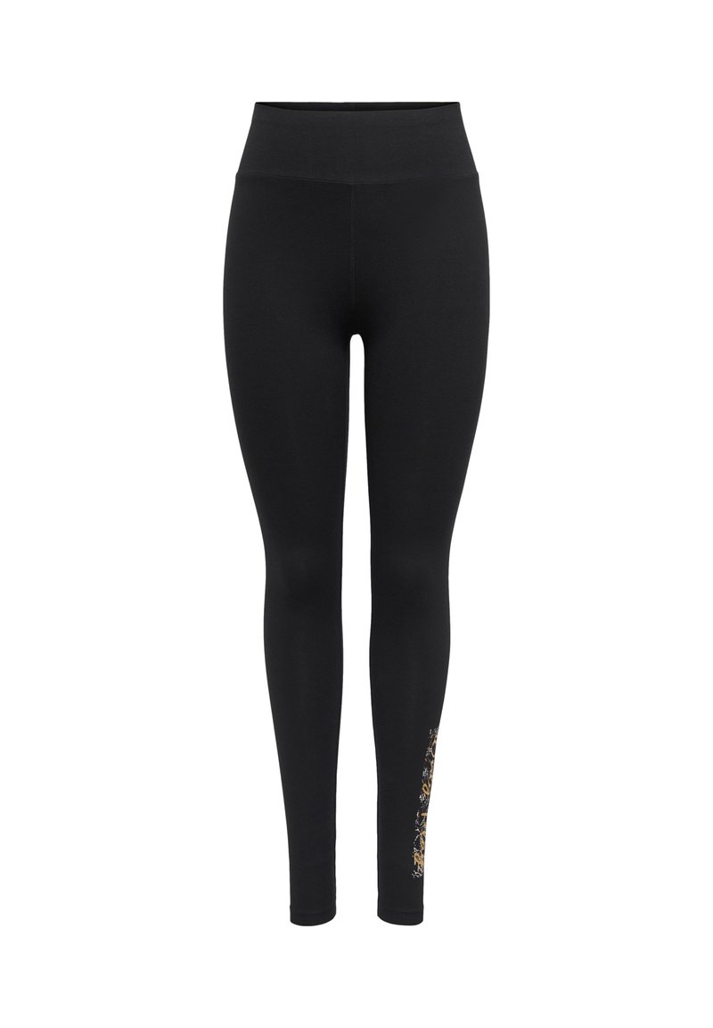 Schwarze Leggings mit hohem Bund aus glattem, dehnbarem Stoff, mit einem dekorativen gold-weißen Muster am unteren linken Bein.