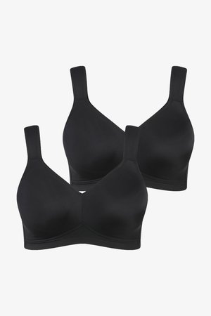 Zwei schwarze drahtlose BHs mit breiten Trägern und nahtlosen Cups, vor weißem Hintergrund gezeigt.