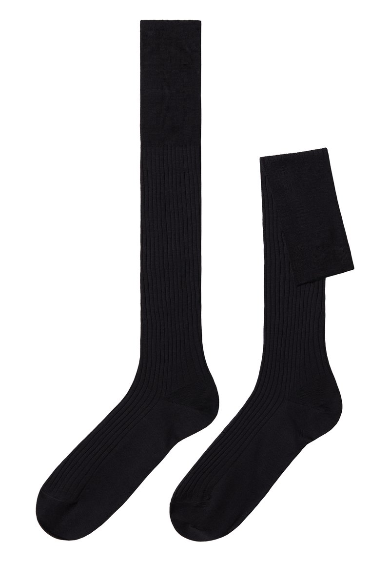 Calcetines negros hasta la rodilla con textura acanalada y puntera y talón reforzados. Tela suave adecuada para la comodidad y el uso diario.