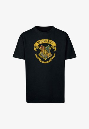 Tricou din bumbac negru, cu un design multicolor al emblemei Hogwarts, accente aurii și text, cu mânecă scurtă și guler rotund.