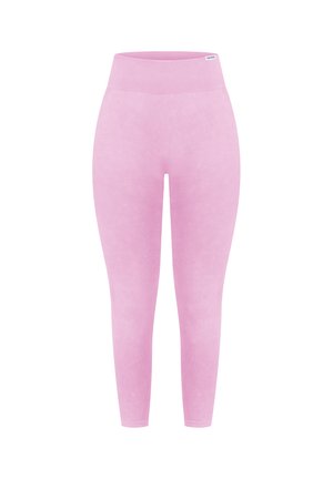 Lichtroze leggings met een hoge, geribbelde tailleband, een gladde textuur en een naadloos ontwerp. Geen patronen of opvallende accenten zichtbaar.