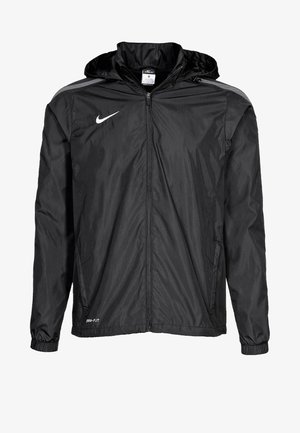 Zwarte Nike windbreaker met een rits aan de voorkant, capuchon en elastische manchetten. Voorzien van reflecterende accenten en lichtgewicht, gladde stof.