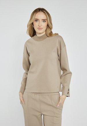 - Bluza