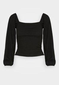 Mustat cropped-topit, joissa on neliön mallinen pääntie, pitkät puff-hihat, rypytetty pinta ja tiukka siluetti. Sileä kangaspinta.