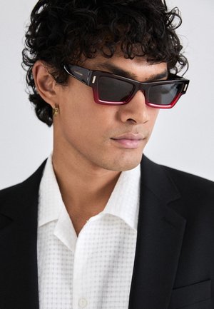 UNISEX - Sunglasses - transparent dark red