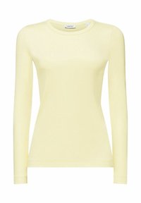 T-shirt jaune à manches longues en tissu extensible et côtelé. Il présente un col rond et un design ajusté avec des poignets standard.