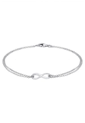 Delicate silver chain bracelet with a small infinity symbol charm and lobster clasp closure, displayed on a white background.
