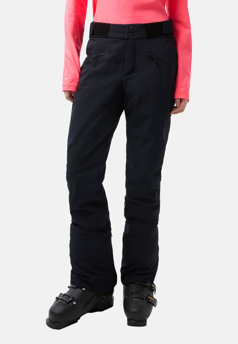 Skihosen in Marineblau, aus strapazierfähigem Material, mit schmaler Passform, verstellbarem Bund mit Klettverschluss und mehreren Reißverschluss-Taschen.