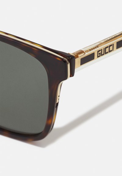 Gucci Saulesbrilles - havana/crystal-green