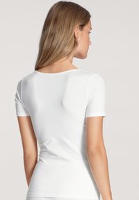 White short-sleeve fitted t-shirt, made of smooth fabric, rounded neckline, and seamless design, shown from the back view.