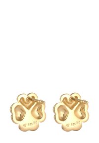 Goldfarbene, blumenförmige Ohrringe mit sanften Kurven, glänzender Oberfläche und einem Klappverschluss. Mit der Prägung "925 AG" für Sterling Silber.
