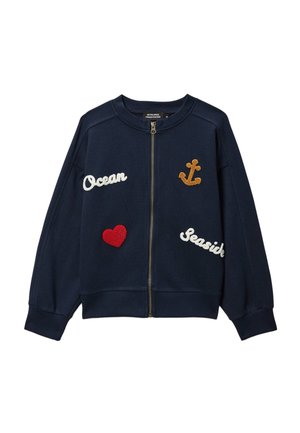 Sweat-shirt zippé bleu marine avec "Ocean", "Seaside", un cœur rouge et une ancre jaune brodés sur le devant.