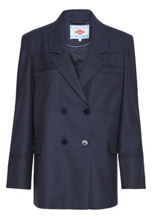 Marinblå dubbelknäppt blazer i strukturerad tyg. Har två stora knappar, spetsiga slag och en enskild bröstficka.