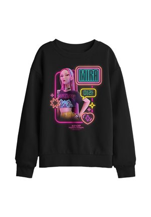 Black sweatshirt with neon-style graphic of a confident animated woman named Mira, colorful symbols, and K-pop Demon Hunters text below.