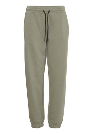 Pantalons de survêtement vert olive clair en mélange de coton doux, dotés d'une taille élastique avec cordons de serrage réglables et de poignets côtelés.