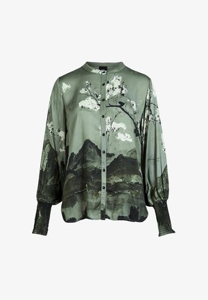 Green silk blouse with mountain and cloud print, button-down front, long puff sleeves with smocked cuffs, and a rounded collar.