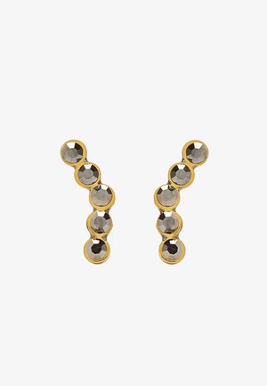 Kolczyki w kolorze złota w kształcie stylizowanej litery „Y”, ozdobione sześcioma okrągłymi, fasetowanymi szarymi kamieniami ułożonymi w linii.