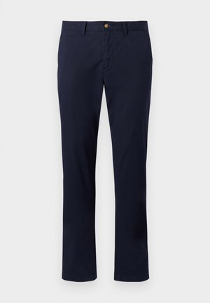 Pantalon homme bleu marine coupe droite avec bouton et fermeture éclair, passants pour ceinture et poches avant, présenté à plat sur un fond blanc.