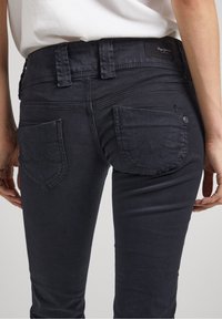 Pepe Jeans Tygbyxor - black