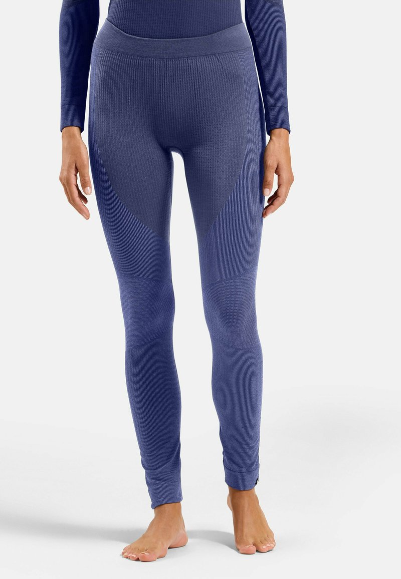 Navy gerippte Leggings mit hohem Bund und Panelelementen. Der Stoff hat eine strukturierte Oberfläche und tapered Knöchelbündchen.