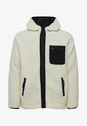 Krémová fleecová bunda s černým zipem vpředu, černou náprsní kapsou a černými bočními kapsami; má kapuci a žebrované manžety.