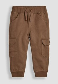 Braune Baumwoll-Cargohosen mit einem Kordelzug in der Taille, zwei seitlichen Taschen und zwei größeren Oberschenkeltaschen. Rippbündchen an den Knöcheln.
