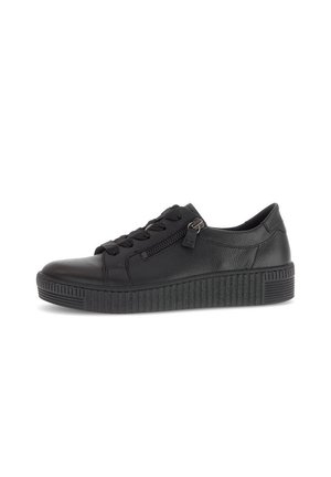 Black leather sneaker with laces and side zipper, featuring a thick textured sole and smooth finish. Rounded shape and minimalistic design.