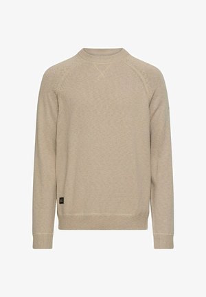 Beiger Pullover mit Rundhalsausschnitt, langen Raglanärmeln, gerippten Bündchen und Saum, gestrickter Textur und einem kleinen Logotag in der Nähe des Saums.