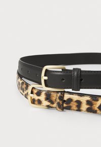 Two belts stacked: one black leather with a smooth texture and the other a leopard-print pattern with a soft, shiny finish. Gold buckles.