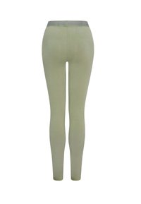 Leggings di un verde chiaro uniforme, con una texture morbida, vita alta e cuciture minime, progettati per il comfort e la flessibilità.