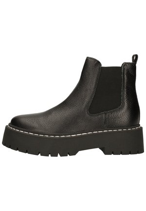 Schwarzer Chelsea-Stiefel aus Leder mit klobiger Profilsohle, elastischem Seitenteil, Zuglasche an der Ferse und weißer Naht entlang der Sohlenkante.