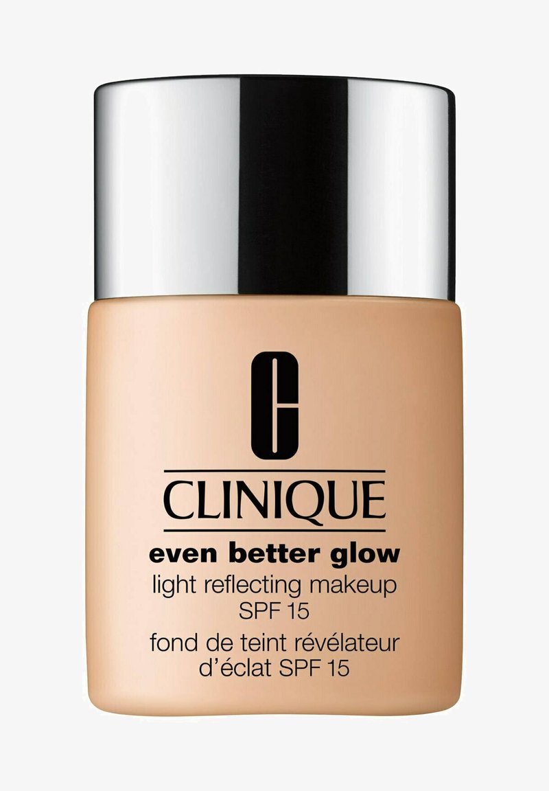 Clinique Even Better Glow lichtreflektierendes Make-up mit LSF 15 in Beige, silberner Deckel.