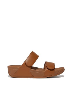 Brown, synthetic strap sandals featuring two adjustable Velcro closures, a cushioned footbed, and a wedge sole for added height.