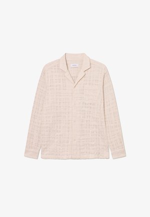 Hosszú ujjú bézs ing könnyű anyagból, mintás textúrával, gombos elülső résszel és egyetlen mellzsebbel.