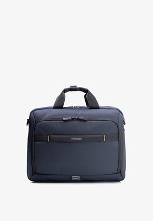 Maletín suave azul marino con asas dobles, bolsillo frontal con cremallera, ribete negro y logotipo "WITTCHEN" en la correa horizontal frontal.
