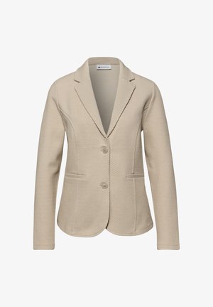 Blazer beige texturizado para mujer con dos botones, solapas con muesca y dos bolsillos delanteros, mostrado sobre un fondo blanco.