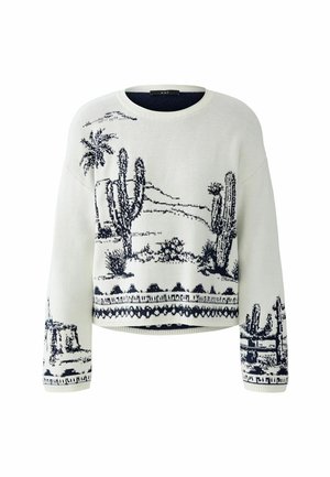 Witte trui met een marineblauw cactus- en woestijnlandschapontwerp, voorzien van een ronde halslijn en lange mouwen met bijpassende patroonmanchetten.