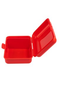 Red plastic lunch box with hinged lid, rectangular shape, smooth texture, and interior divider. Opened position reveals storage space.