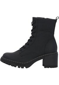 Black ankle boot made of smooth leather, featuring a round toe, lace-up front, and chunky block heel with a textured sole. White stitching detail.