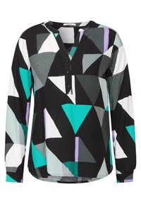 Blouse à manches longues avec un motif géométrique en noir, vert, blanc et lavande, avec un devant boutonné et un décolleté en V.