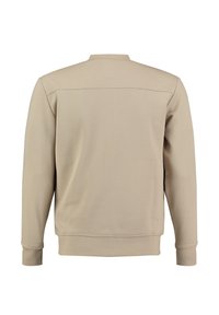 Sudadera beige de cuello redondo hecha de tejido texturizado. Cuenta con mangas largas y puños de canalé. Diseño simple, sin logotipos ni adornos visibles.