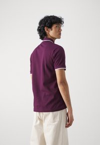 BOSS PASSERTIP - Polo shirt - medium purple