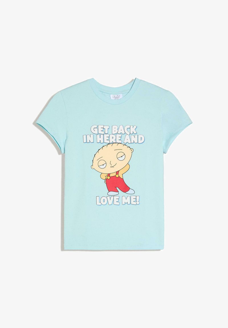 T-shirt bleu clair avec un personnage de dessin animé portant une salopette rouge et le texte « Reviens ici et aime-moi ! » centré sur le devant.