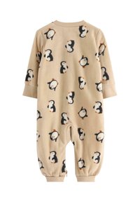 Beige fleece heldragt med et gennemgående pingvinmønster. Har lange ærmer, elastiske manchetter og en lynlåslukning foran for nem påklædning.